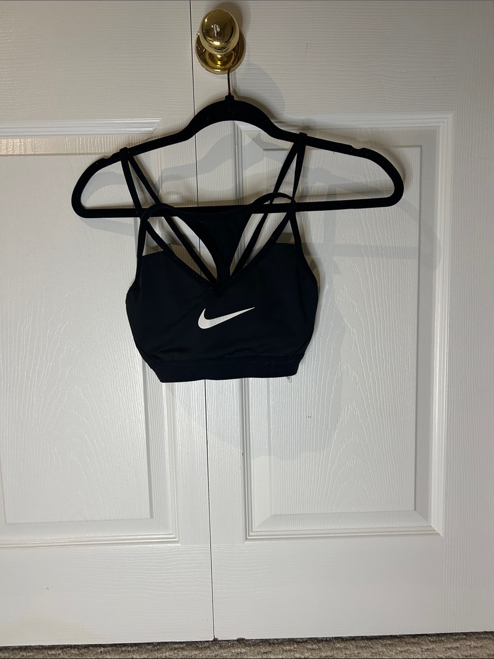 Nike Black Strappy Low-Impact Sports Bra with White Swoosh